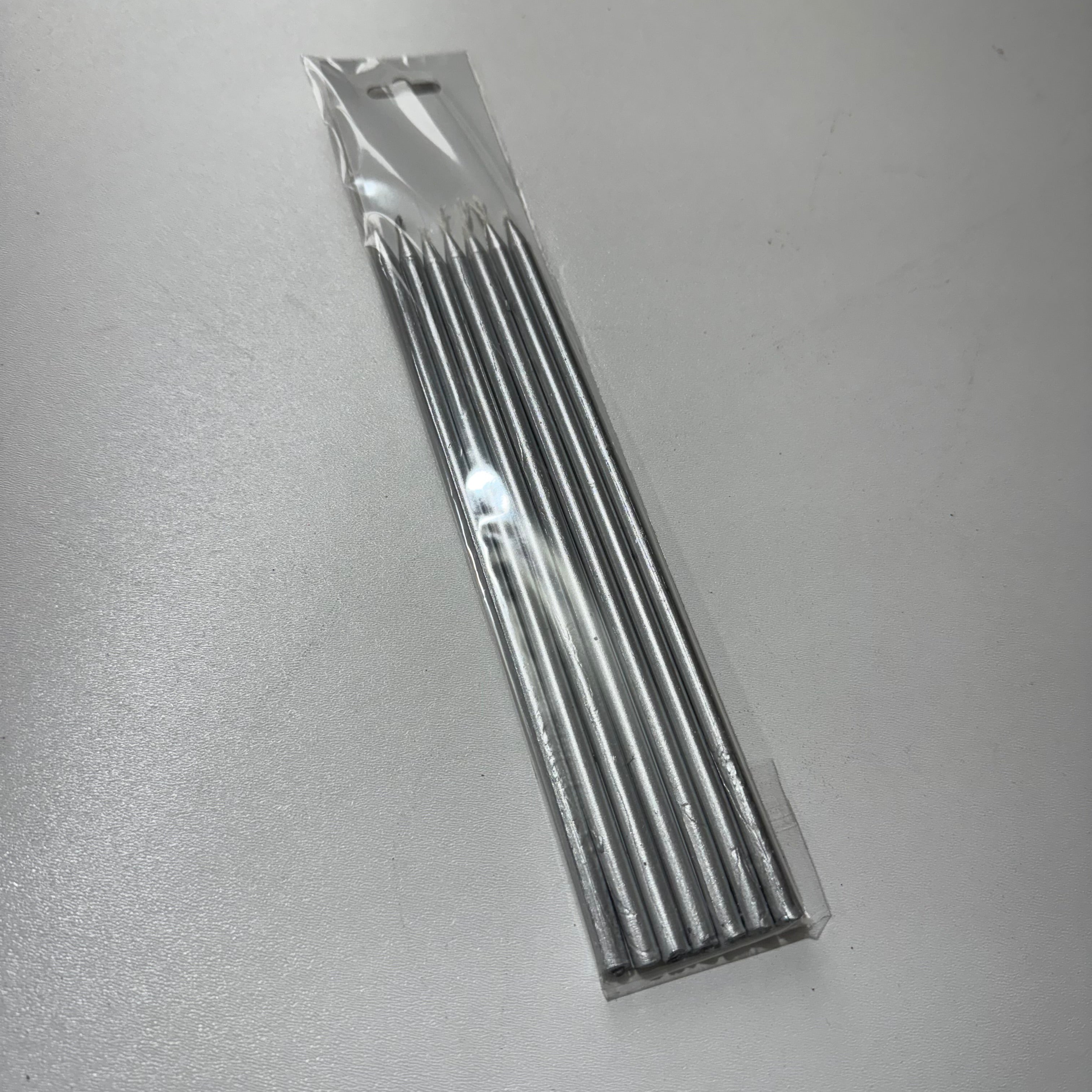 10-Piece Set: 7 Metallic Silver Taper Candles – "Modern and Crystalline Shine for Celebrations"
