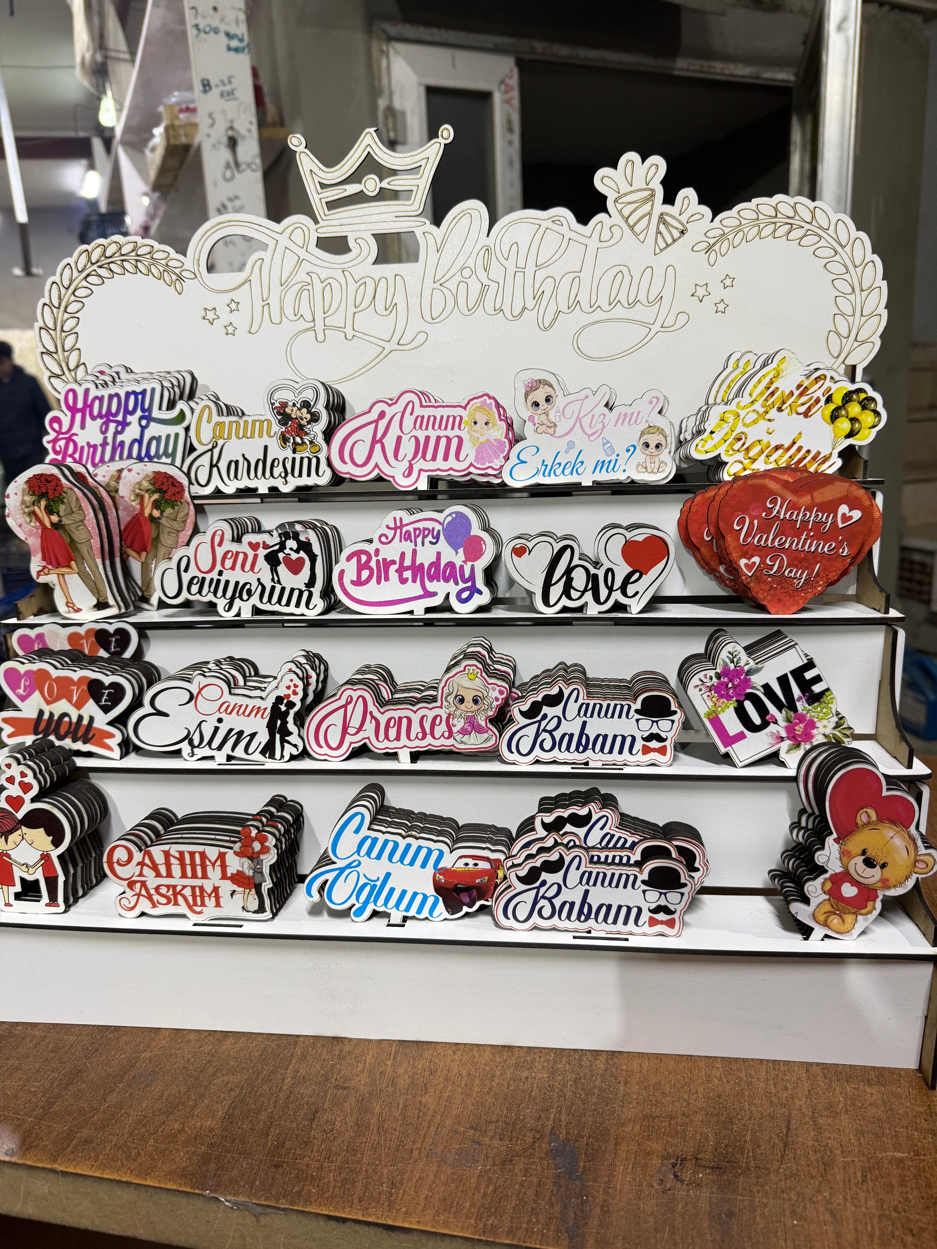Collection of 200 Colored Printed MDF Cake Toppers with Stands